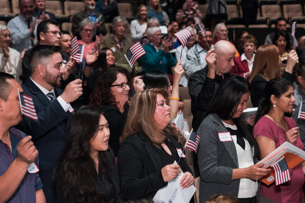 Group of people at oath ceremony.